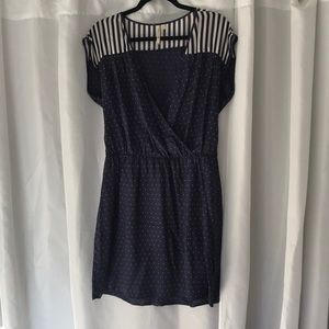 Large navy dress with cream stripes & polka dots.